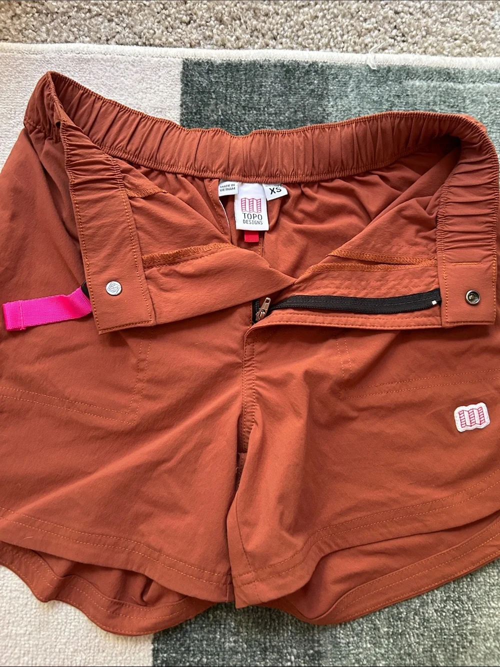 Topo Designs Rust Athletic Shorts with Pink Belt